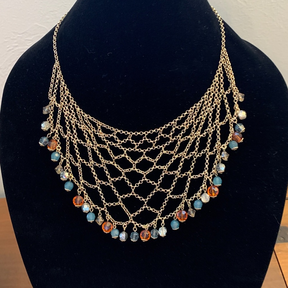 Gold net-like necklace